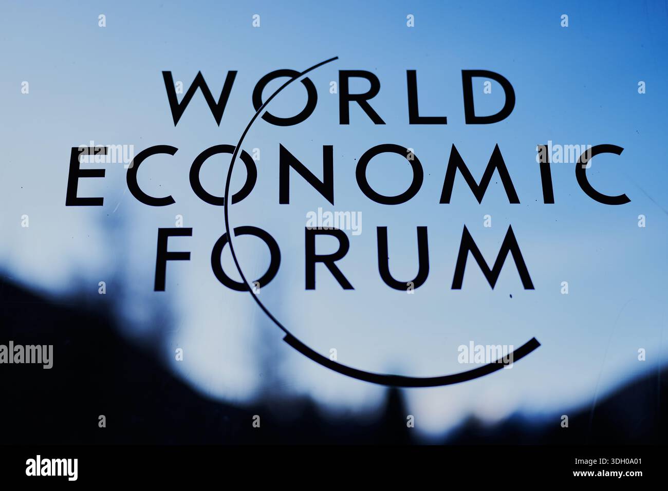 The logo of the World Economy Forum is displayed on a window of the ...