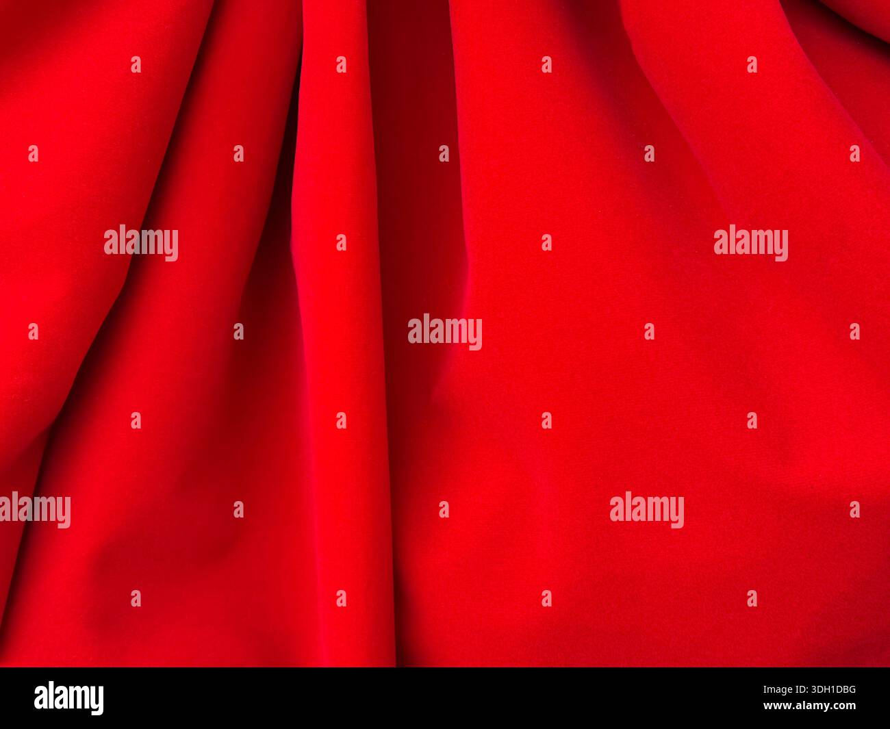 Red textile fabric bright background Stock Photo