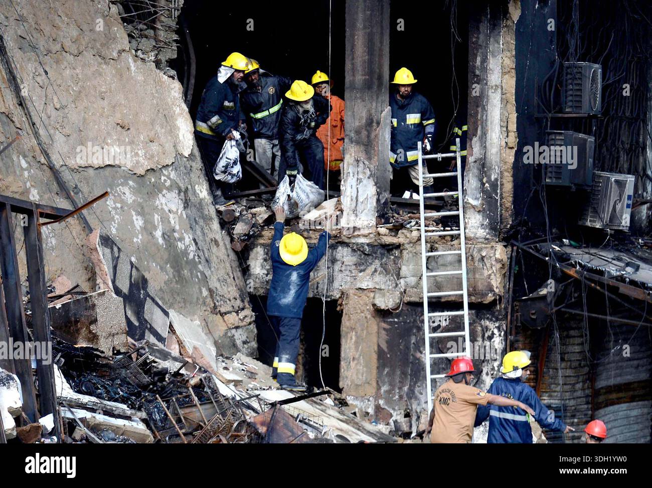 View of site after fire broken out incident at Gul Plaza shopping mall ...