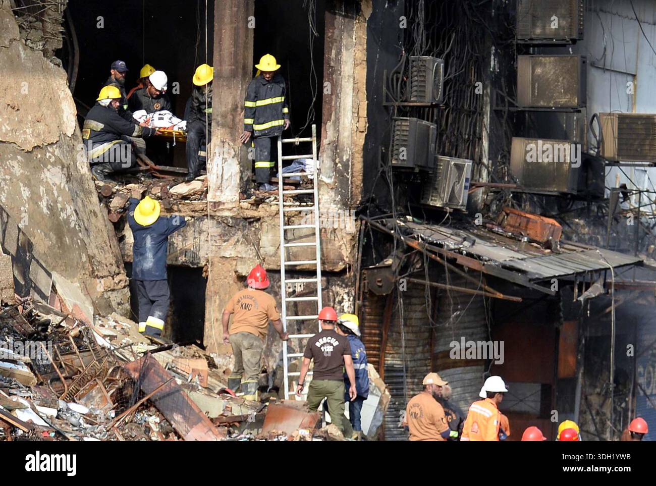 View of site after fire broken out incident at Gul Plaza shopping mall ...