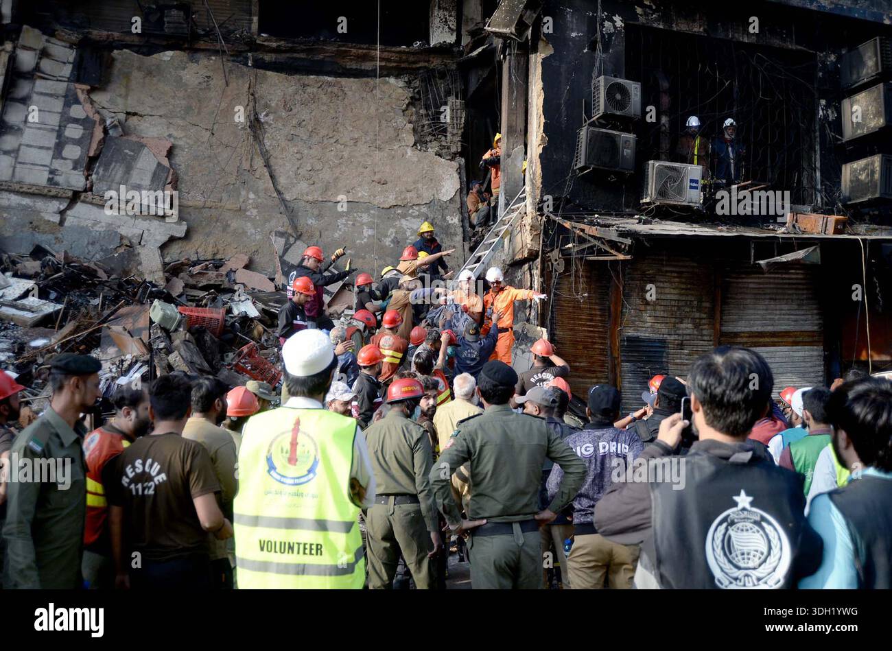 View of site after fire broken out incident at Gul Plaza shopping mall ...