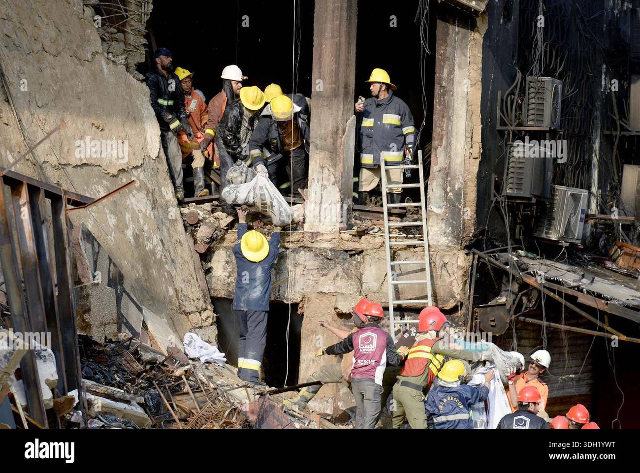 View of site after fire broken out incident at Gul Plaza shopping mall ...