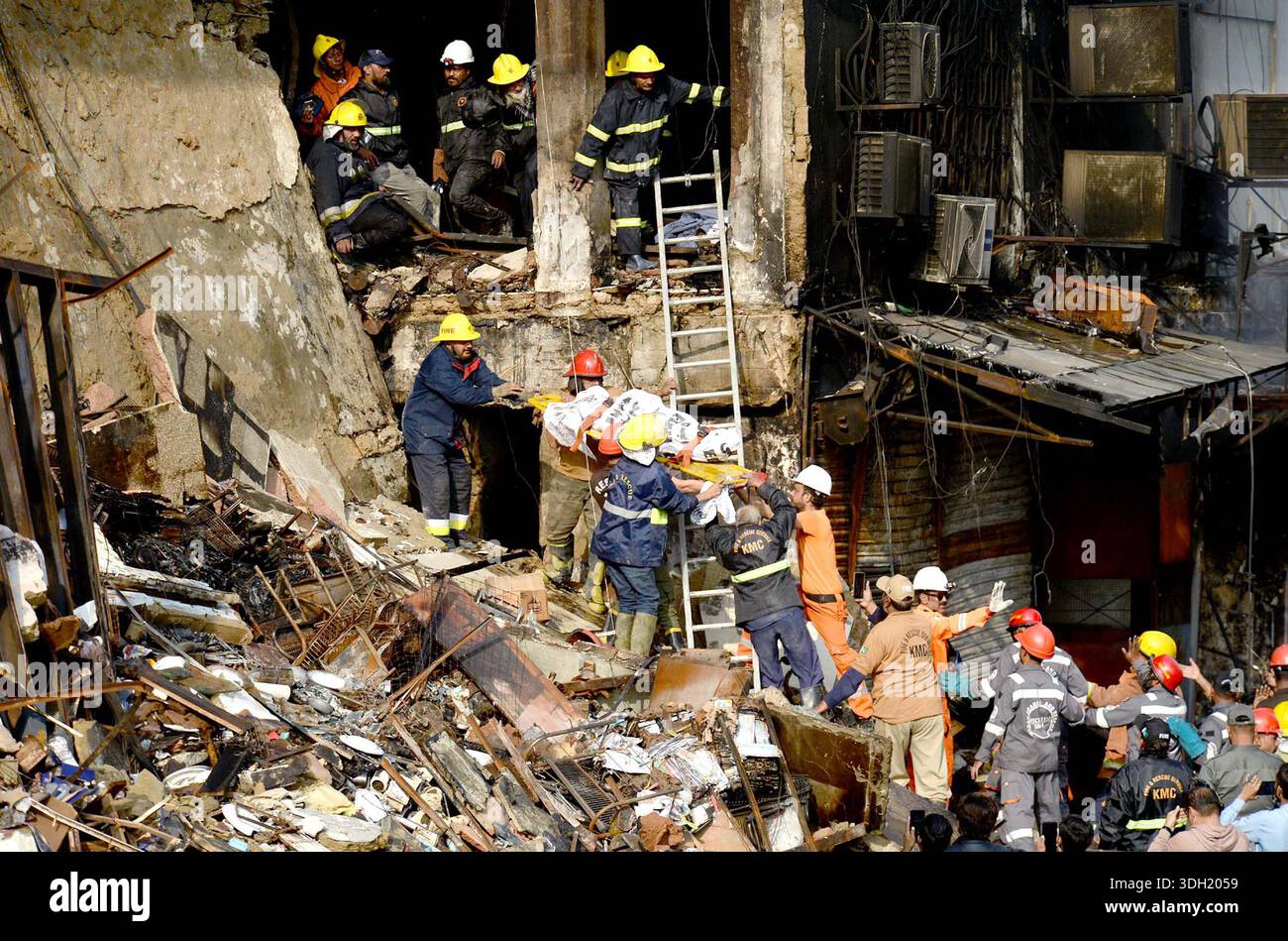 View of site after fire broken out incident at Gul Plaza shopping mall ...