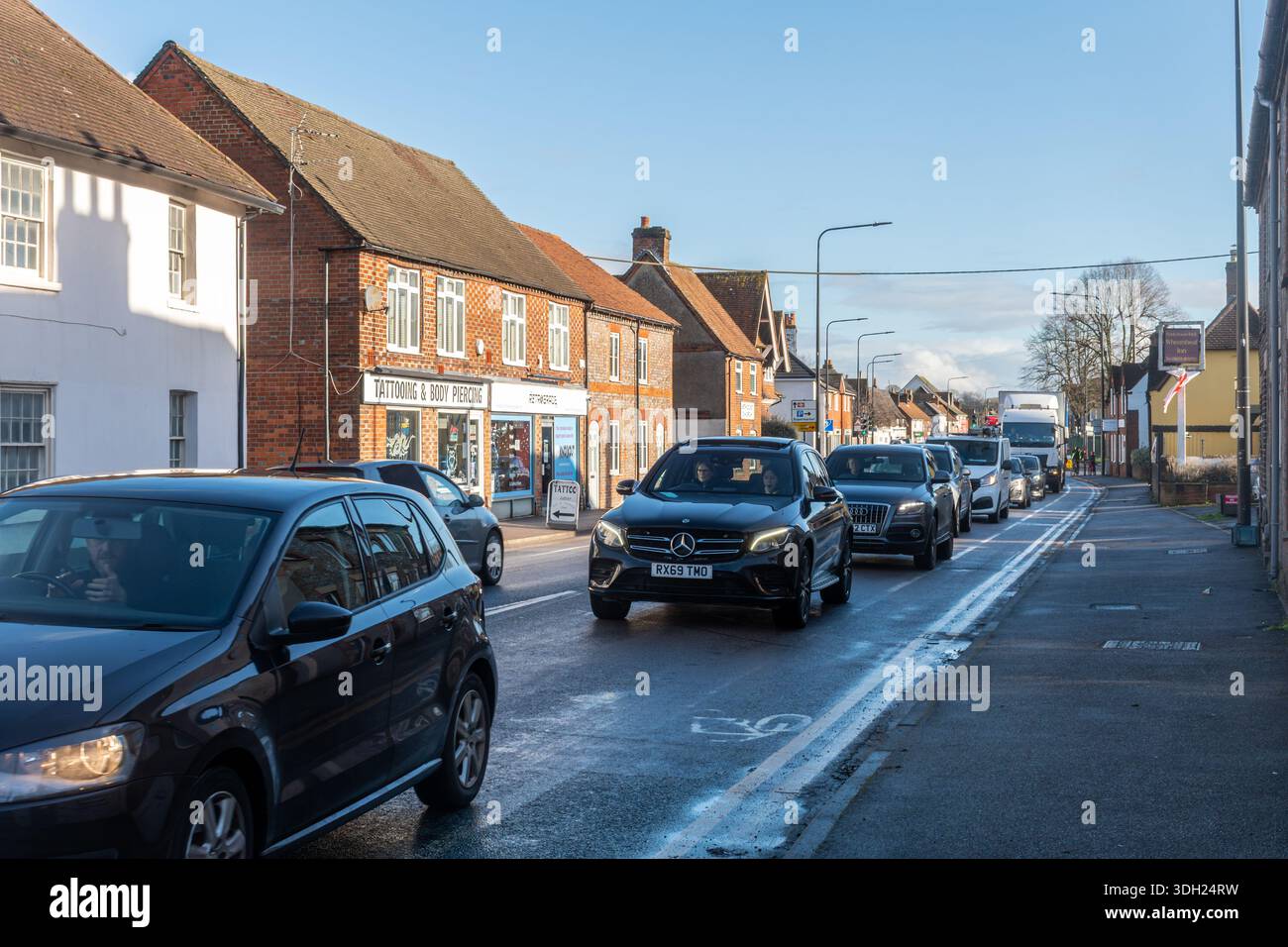 View of the A4 main road through Thatcham town, Berkshire, England, UK, with heavy traffic, lots of cars Stock Photo