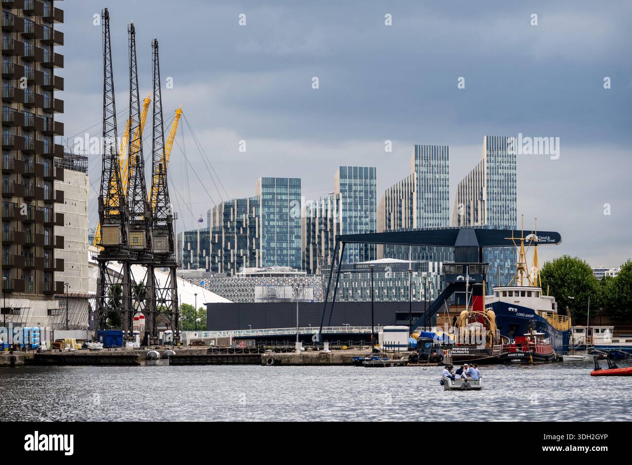 Apartment buildings at Upper Riverside on Greenwich Peninsula rise ...