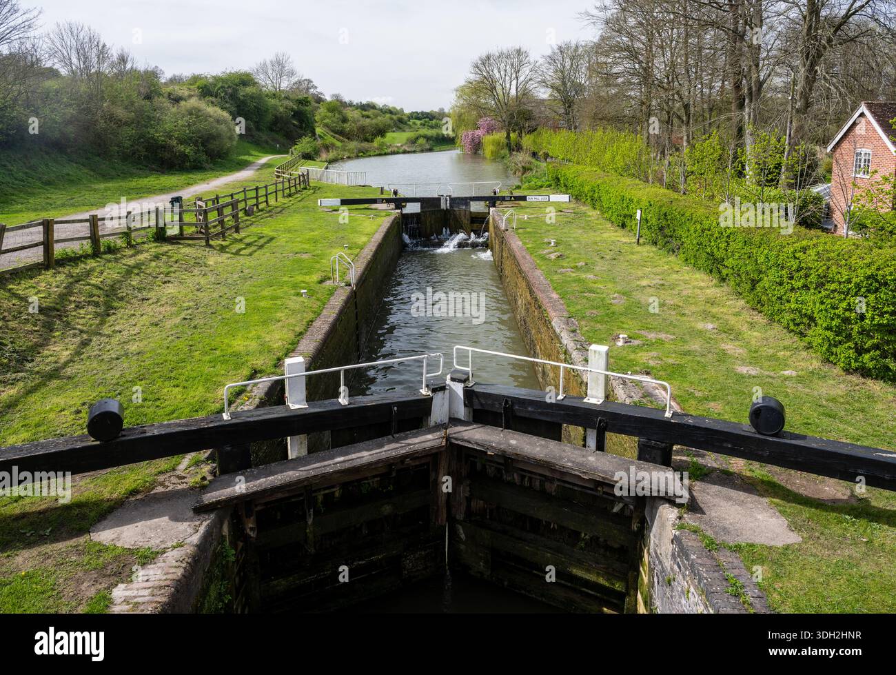 Dun Mill Lock on the Kennet and Avon Canal near Hungerford in West Berkshire, England. Stock Photo