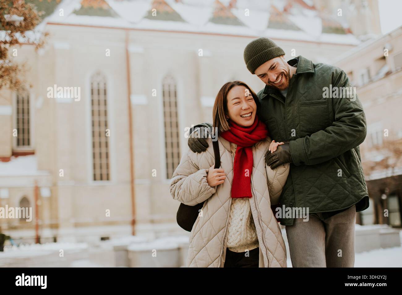 Man walking arm around woman hi-res stock photography and images - Alamy