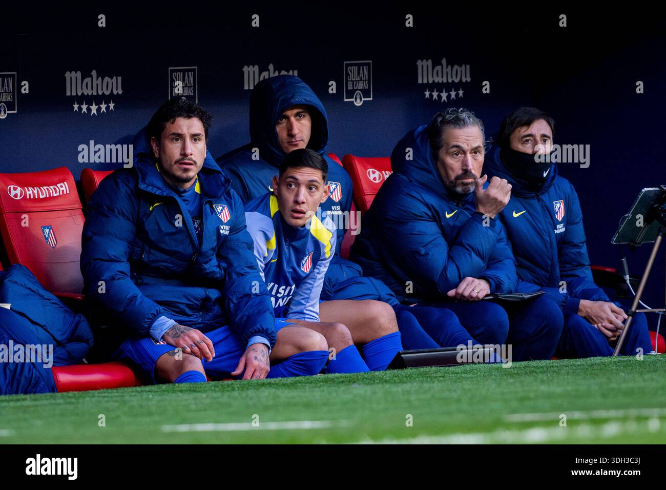 Madrid, Madrid, Spain. 18th Jan, 2026. Players of Atletico de Madrid (from  L to R) Jose Maria Gimenez, Nahuel Molina sit on the bench during the  LaLiga EA Sports football match between
