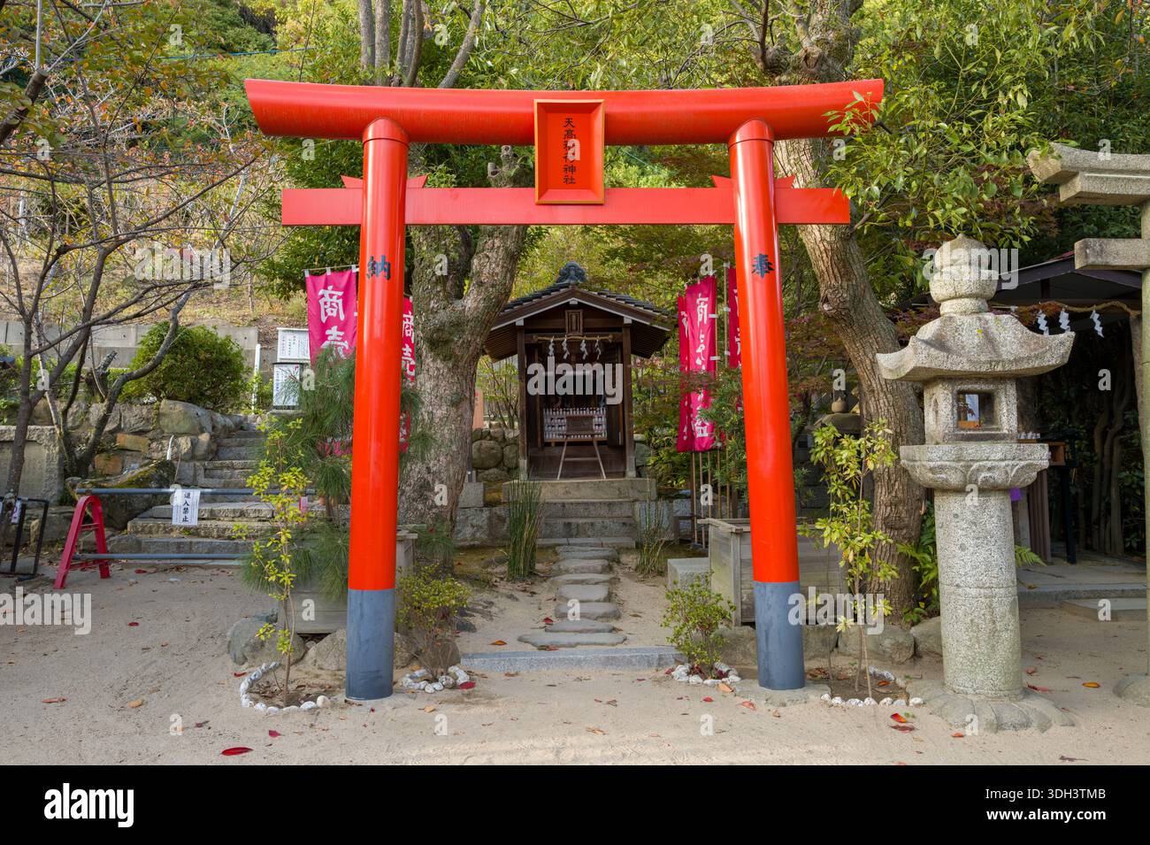Red torii gate stands hi-res stock photography and images - Alamy