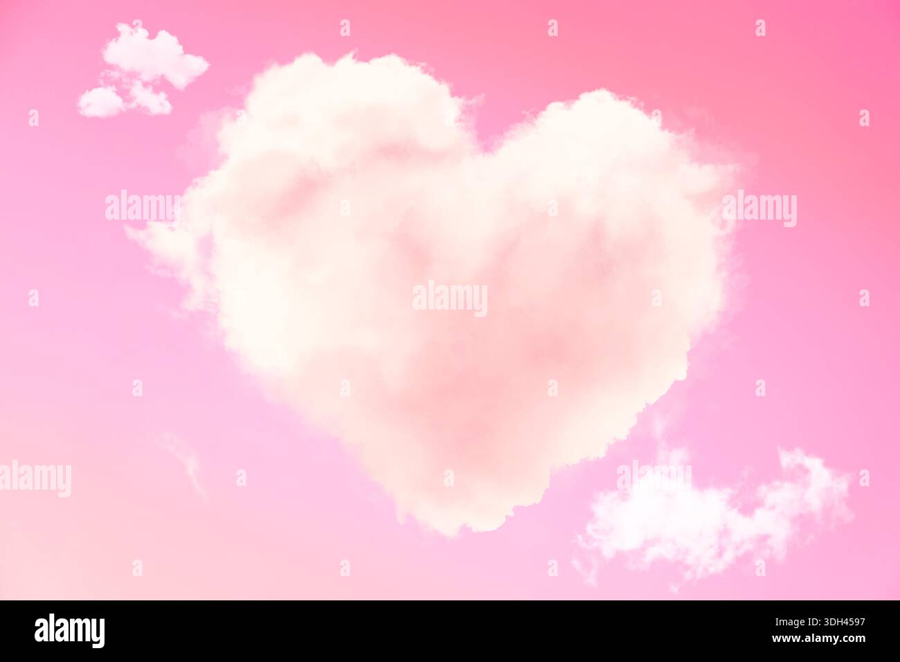 Fluffy cloud in shape of heart in pink sky Stock Photo - Alamy