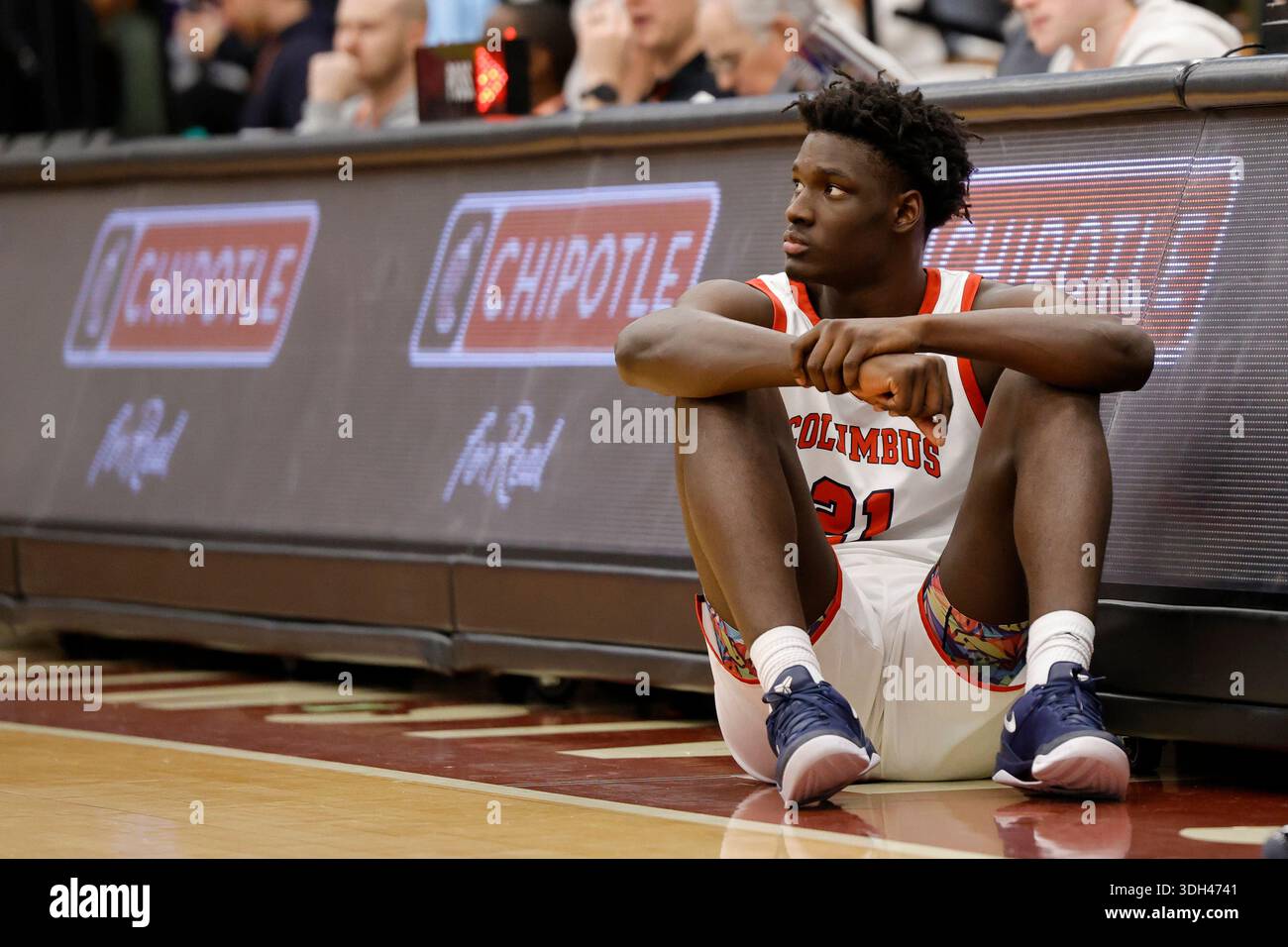 Christopher Columbus Caydin Gaskins (21) waits at the scorer's table ...