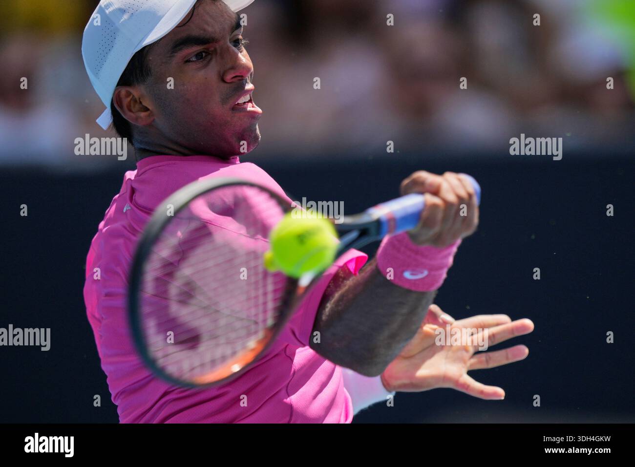 Nishesh Basavareddy of the U.S. plays a forehand return to Christopher ...