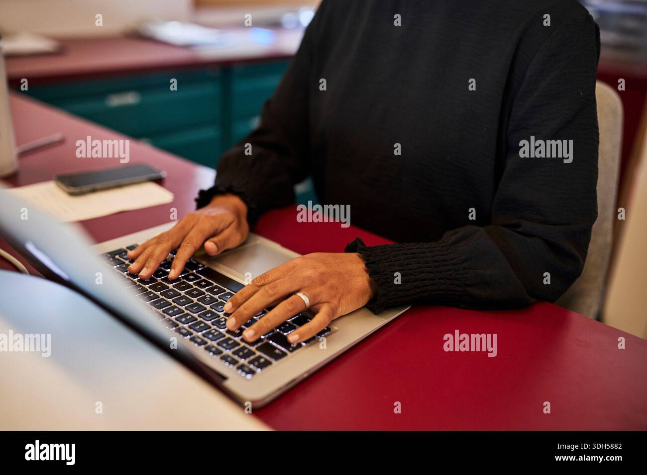Hotel Receptionist Job Using Computer Working at the Hotel Reception Desk Using a Computer Stock Photo - Alamy