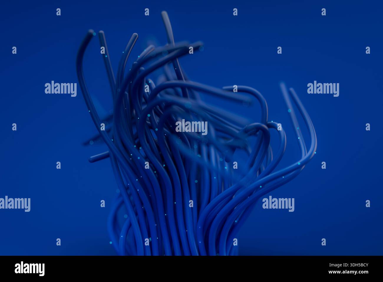 An abstract digital image featuring an artistic arrangement of blue wires extending dynamically against a blue background, symbolizing technology and Stock Photo