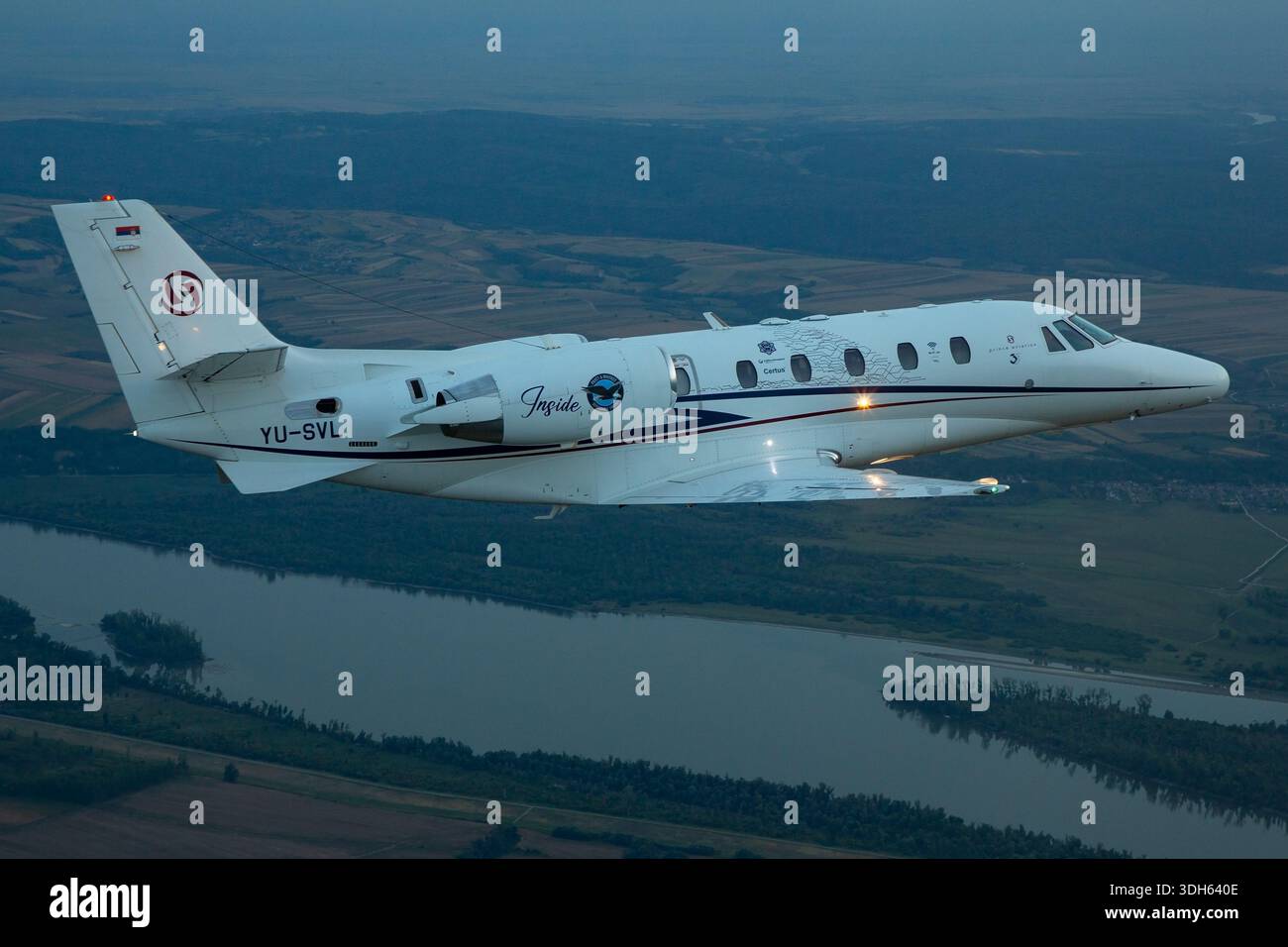 Air to air photograph showing a Cessna 560XL Citation XLS twin engine ...
