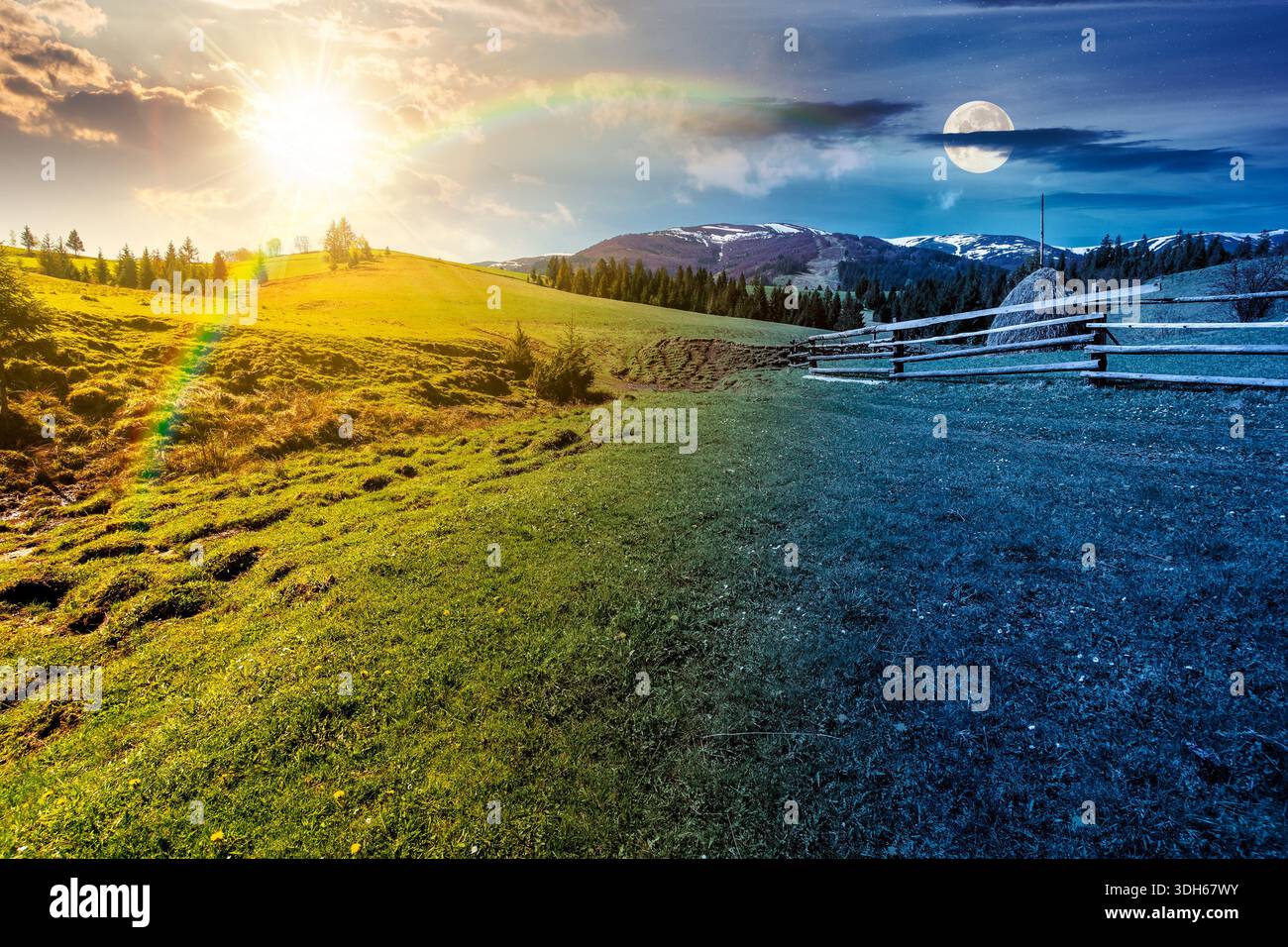 rural landscape in spring. day and night time change concept. haystack near fence on meadow with sun and moon at twilight. forest on rolling hills. mo Stock Photo