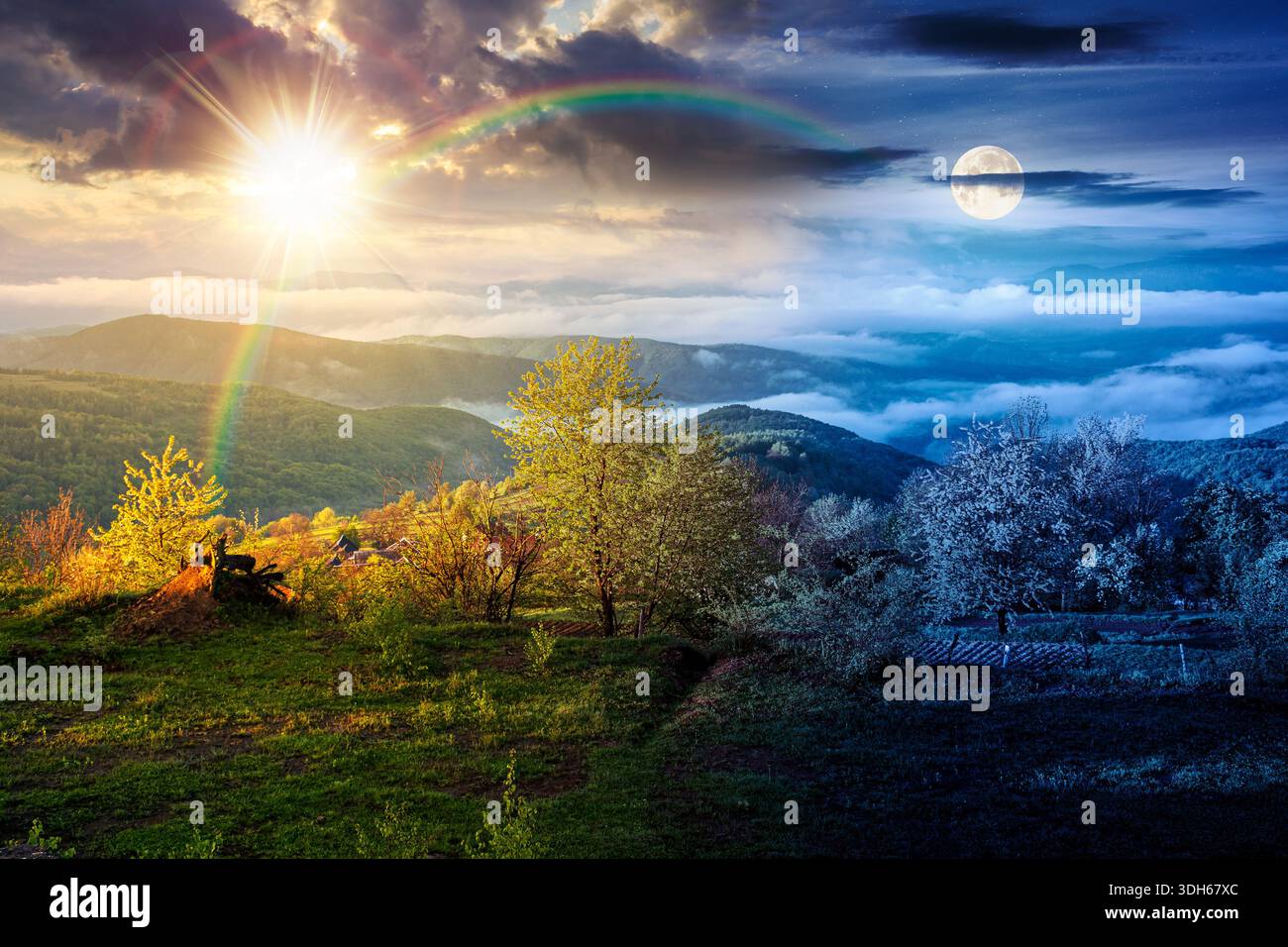 mountain landscape in fog. day and night time change concept. lush green alpine meadows in spring with sun and moon at twilight. beautiful view in to Stock Photo