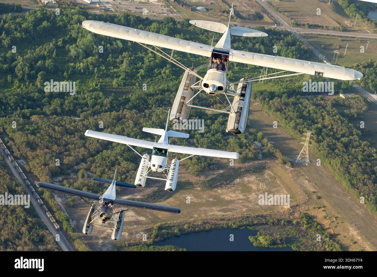 This formation features Cessna 172S Skyhawk II N1430V, Piper PA-18 ...