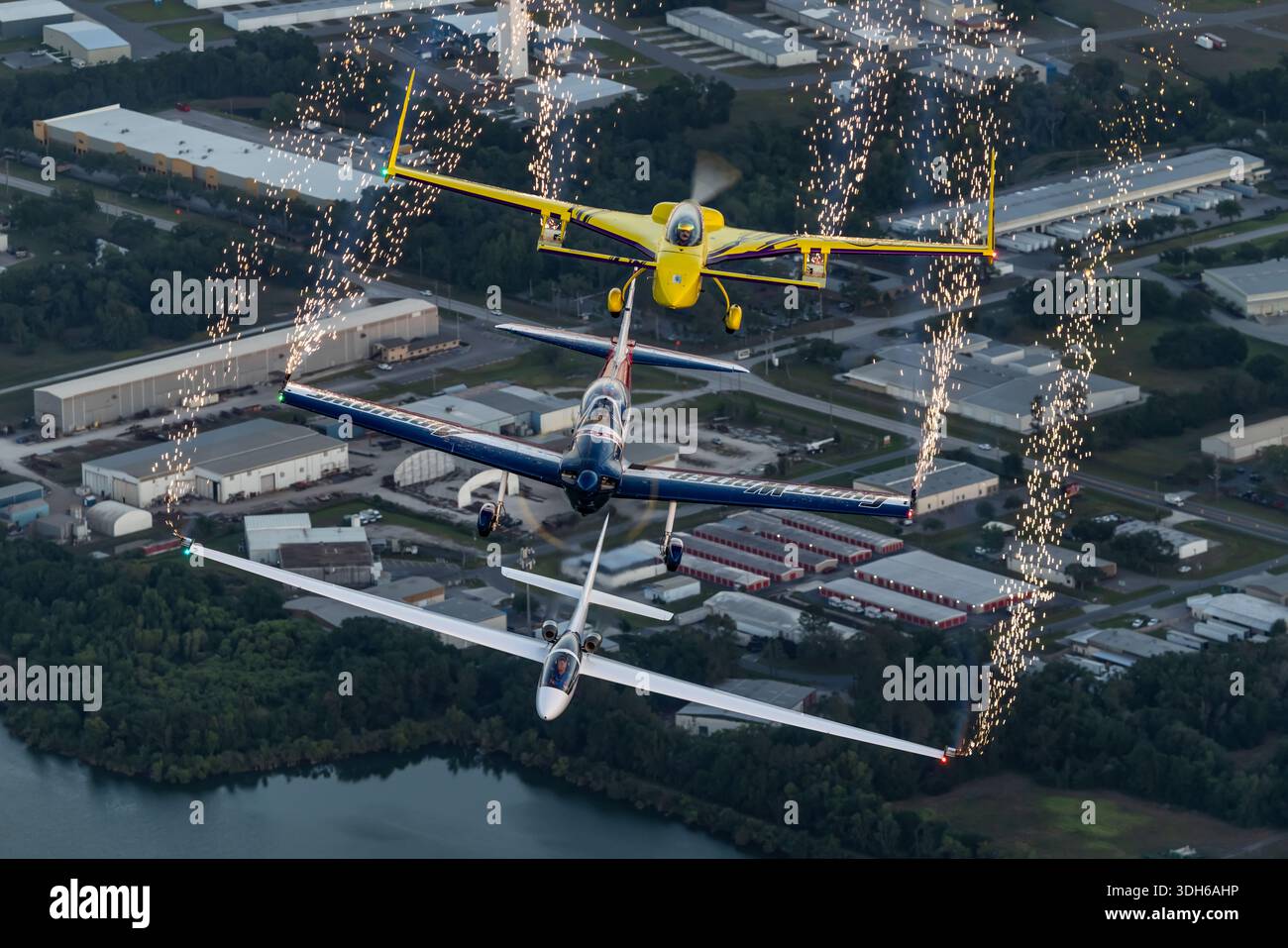 Three aircraft are shown flying in close formation as part of an ...