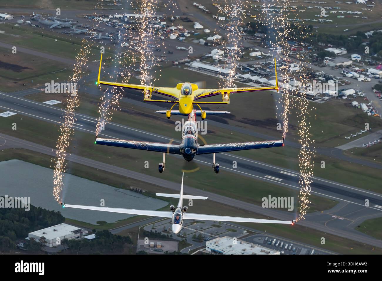 Air to air photograph of a coordinated aerobatic team composed of three ...