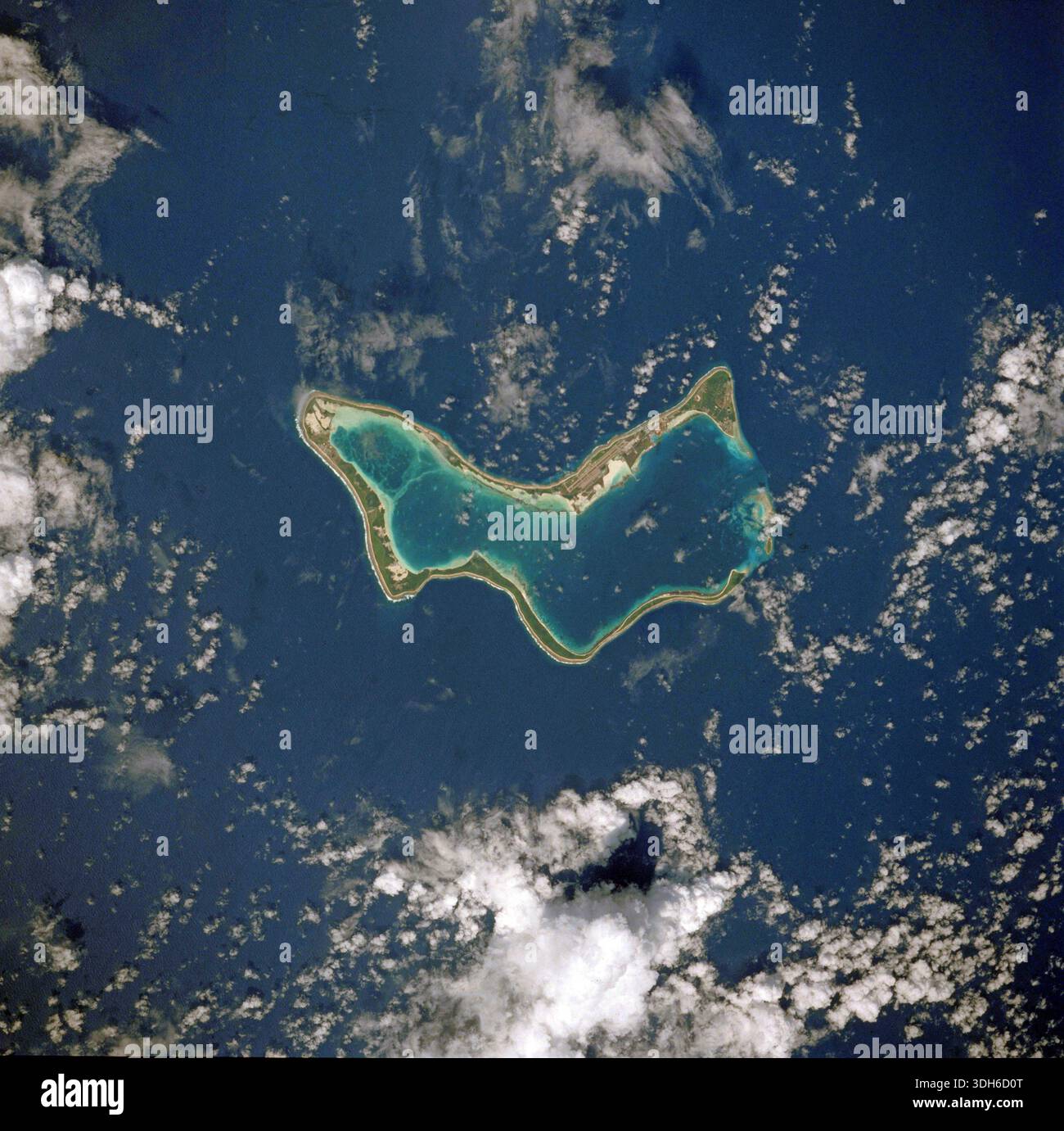 Diego Garcia, principal island in the Chagos Islands archipeleago photographed from space. An optimised vand corrected version of an orignal NASA image. Credit: NASA Diego Garcia is the largest island in the Chagos Archipelago, a strategic UK-US military base in the Indian Ocean, known for its restricted access and history of Chagossian displacement; it's a key part of the British Indian Ocean Territory, but recent UK-Mauritius treaties aim to transfer sovereignty, with the base remaining leased by the UK for at least 99 years. Stock Photo