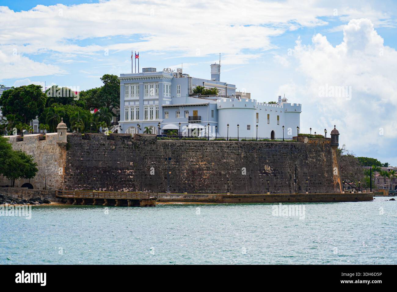 La Fortaleza and the historic defensive walls from San Juan Bay, Puerto Rico Stock Photo