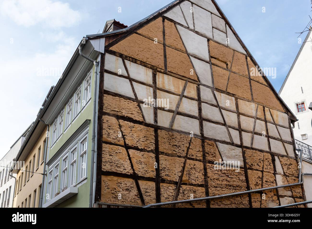 Timbered Historic half timbered house facade with exposed wooden beams and clay ...
