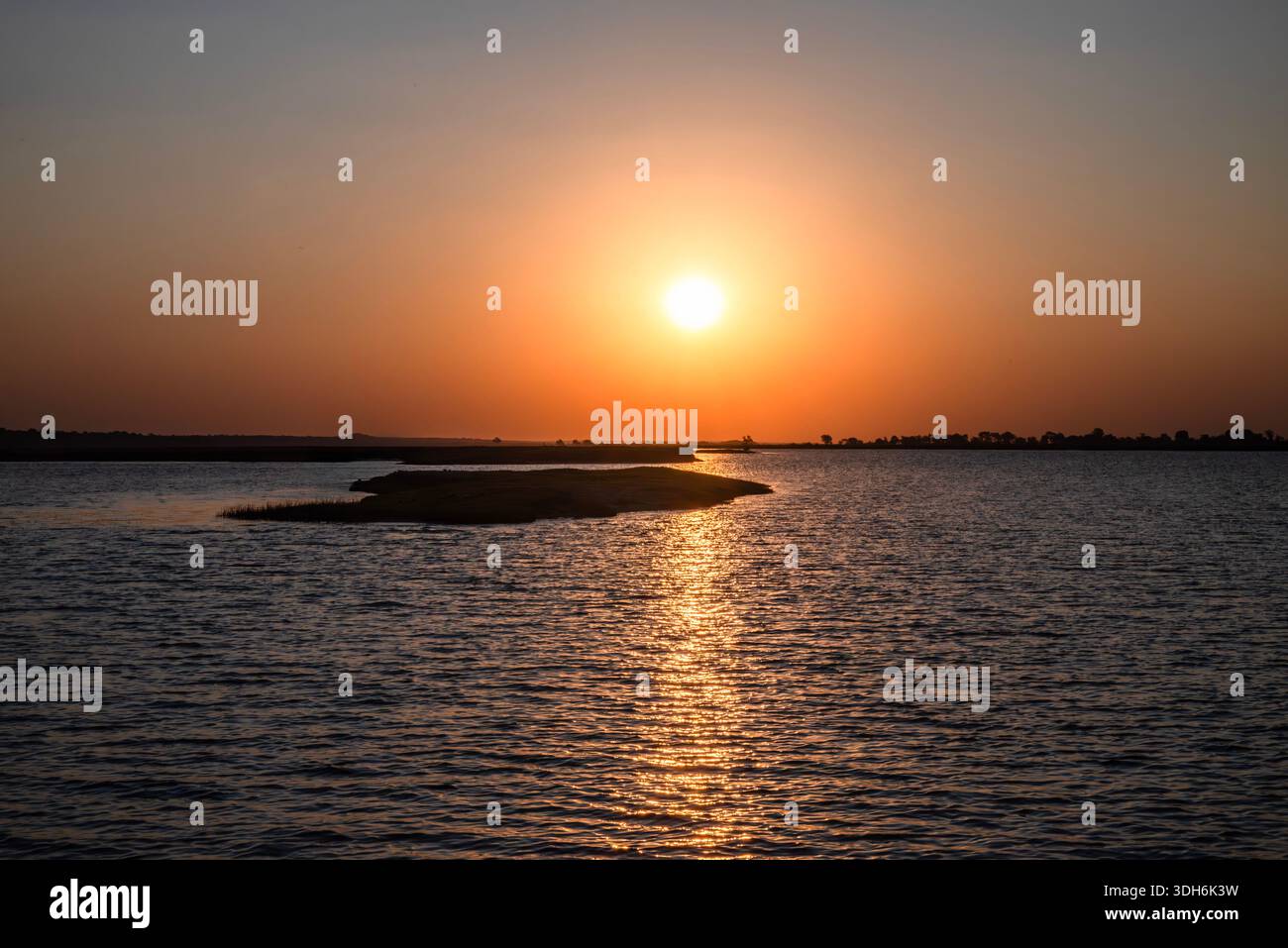 Fiery sunset over the Chobe River, Botswana Stock Photo