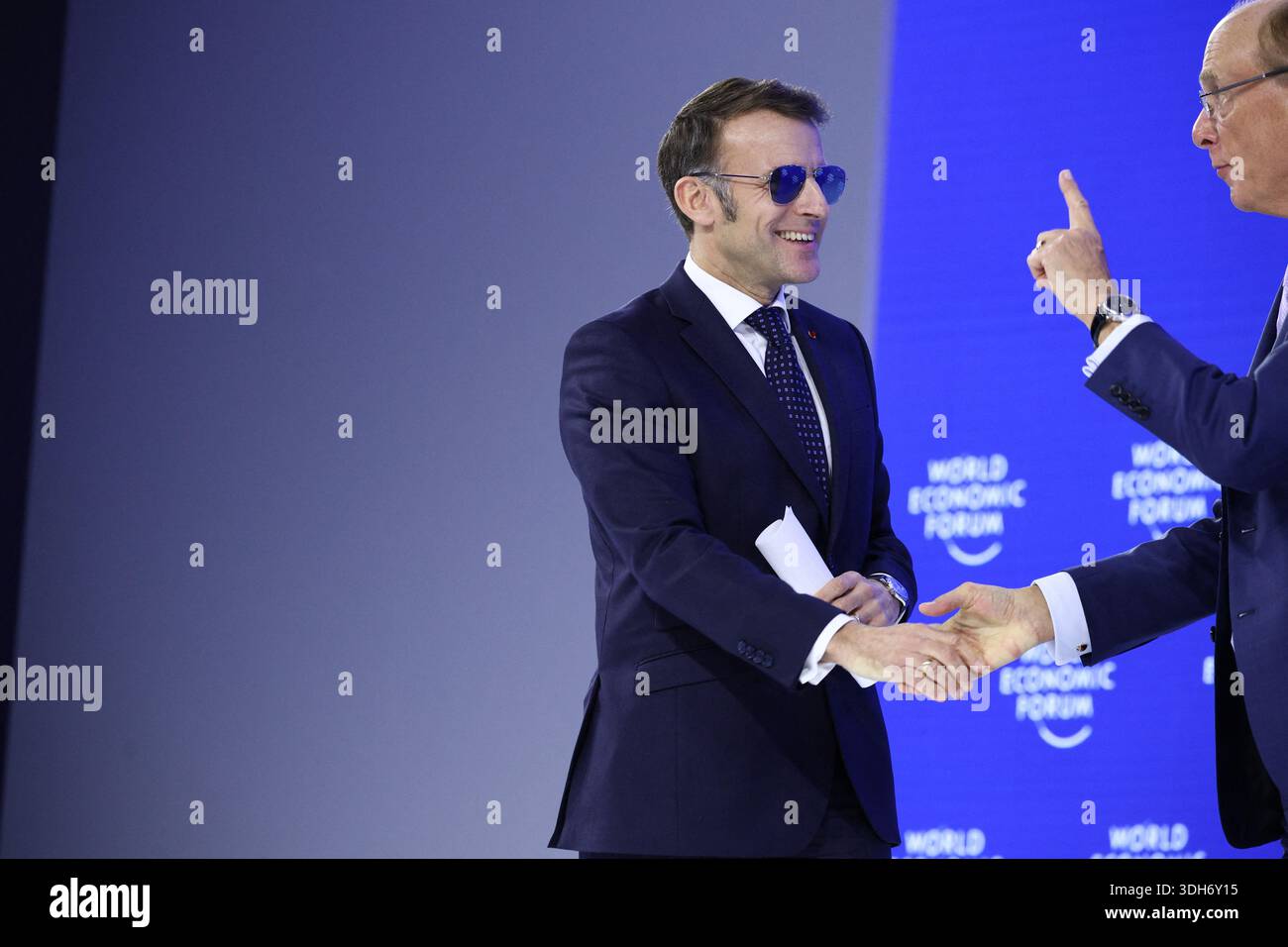 Davos Klosters, Switzerland. 20th Jan, 2026. Larry Fink, Chief Executive  Officer of BlackRock and President Emmanuel Macron during the World  Economic Forum (WEF) annual meeting in Davos, Switzerland on January 20,  2026.