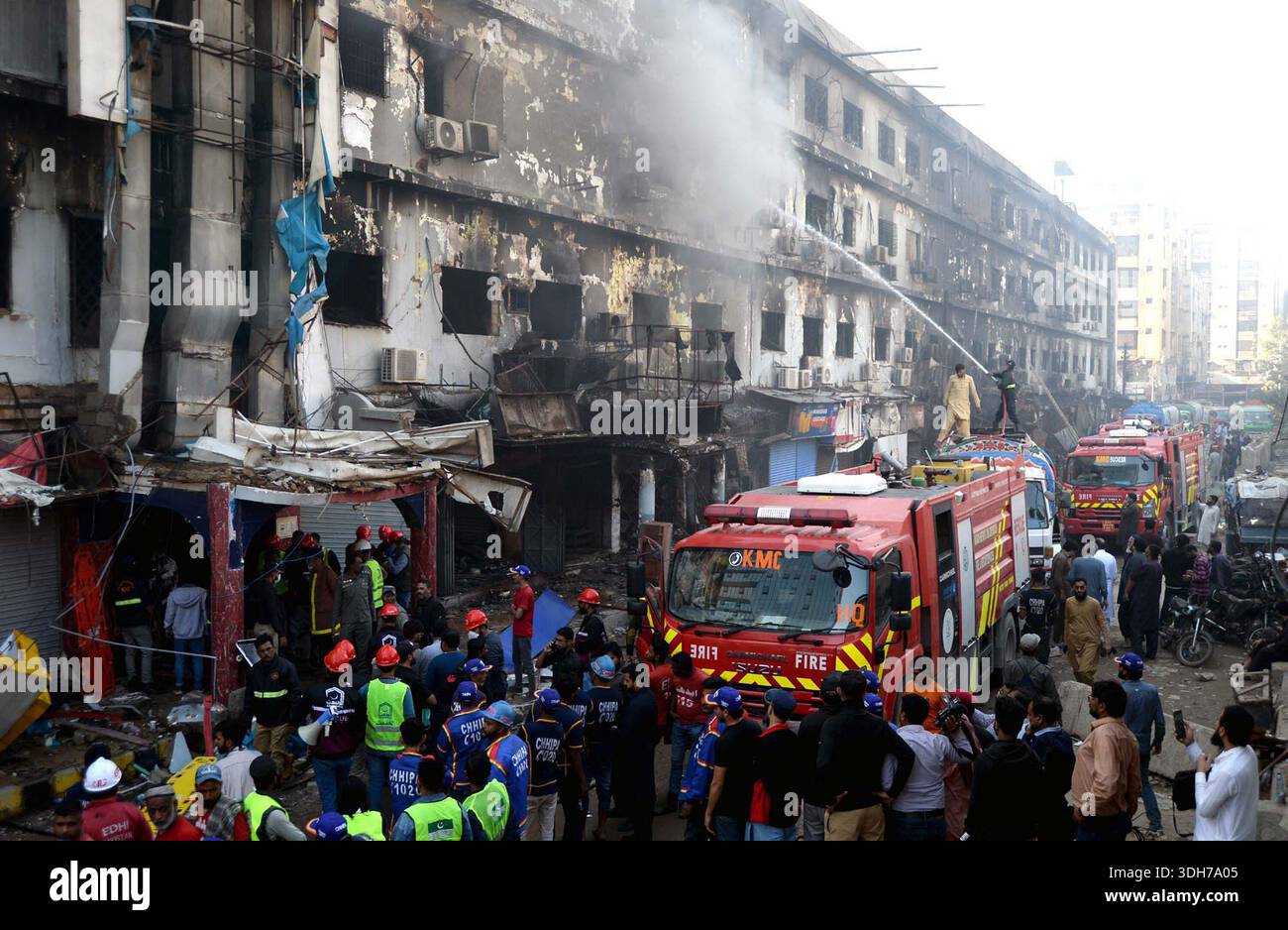 View of site after fire broken out incident at Gul Plaza shopping mall ...