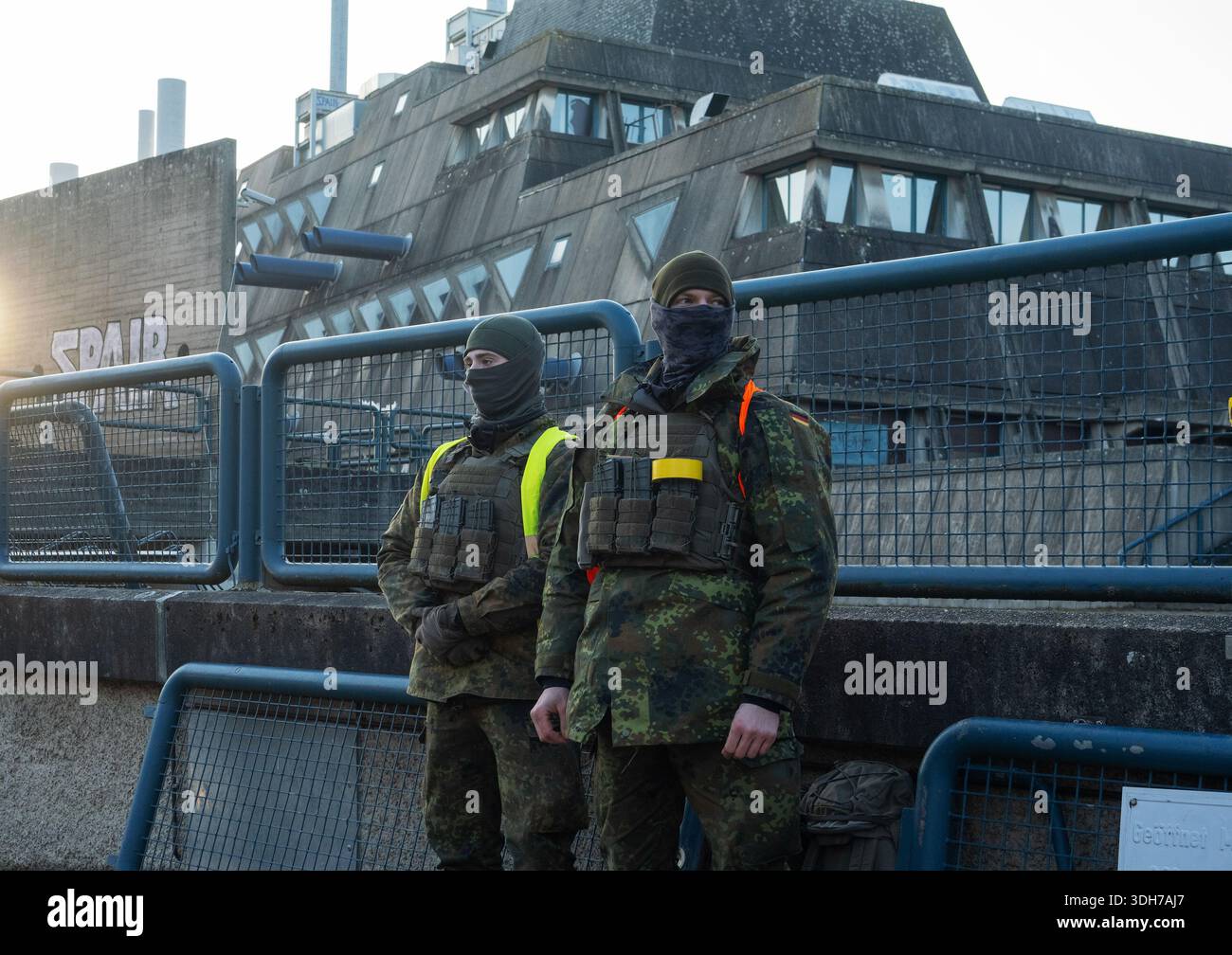 Berlin, Germany. 20th Jan, 2026. Masked members of the Bundeswehr stand ...