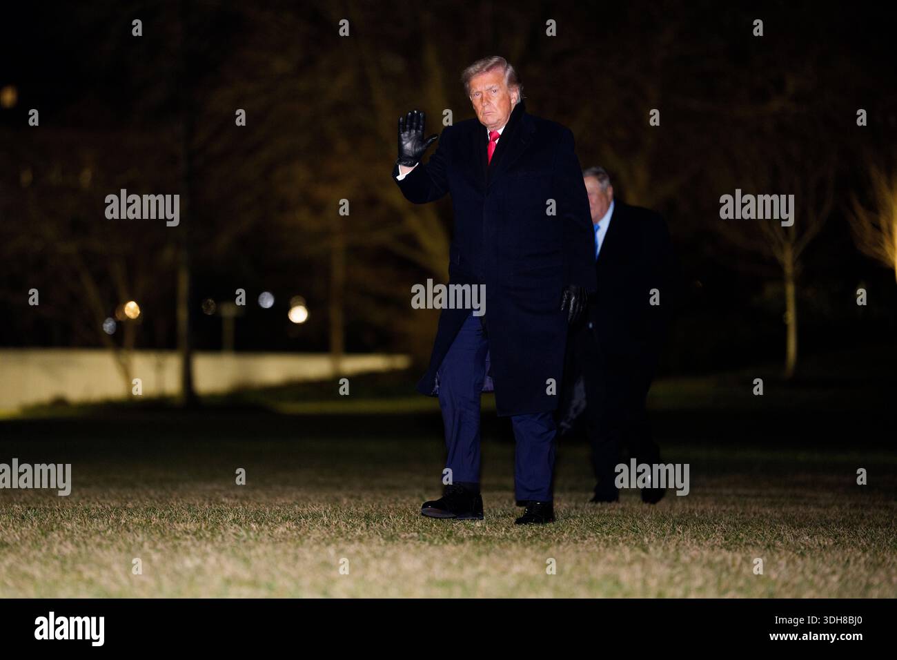 United States President Donald J Trump and waves as he arrives at the ...