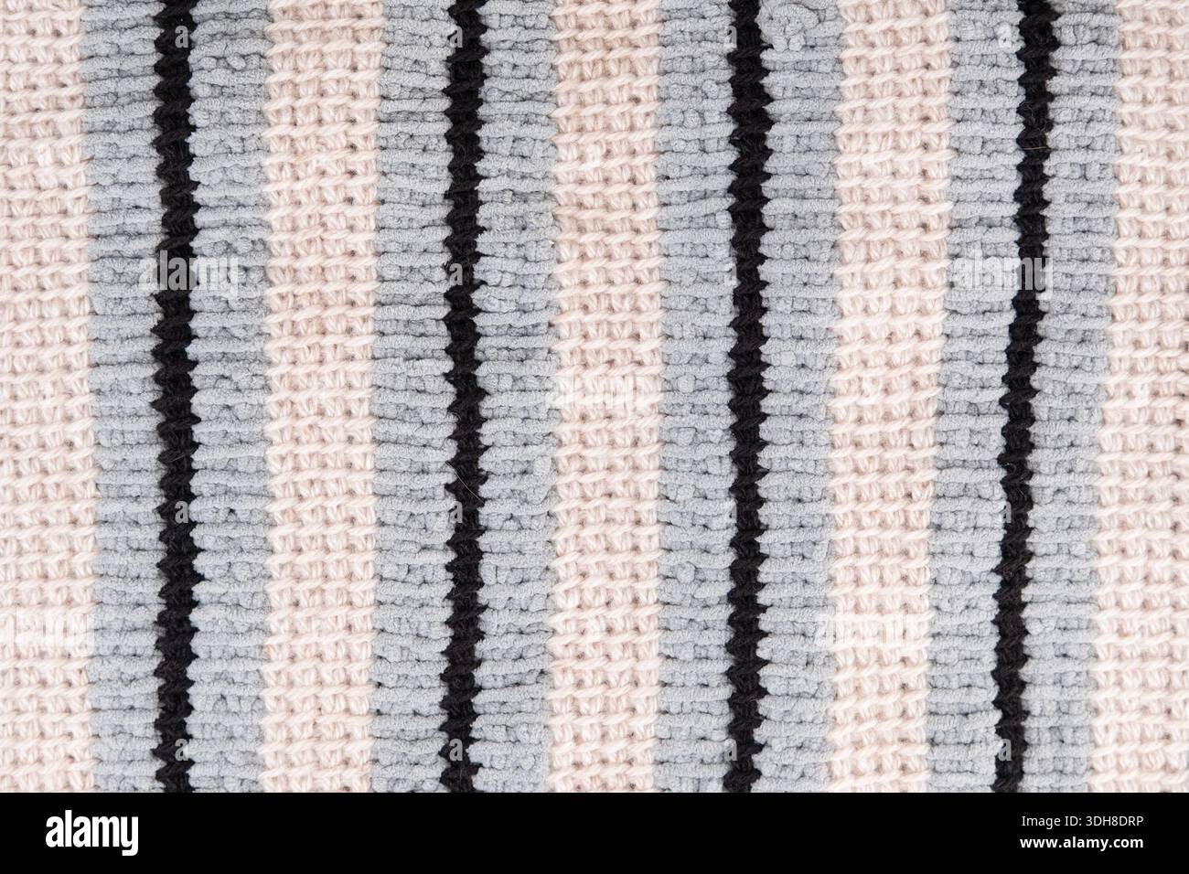 background knitted striped fabric close up. Stock Photo
