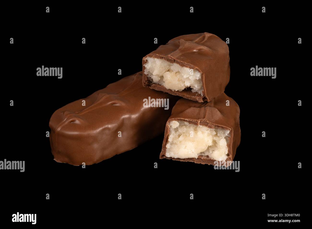 Three chocolate bars with one of them cut in half. The bars are stacked on top of each other Stock Photo