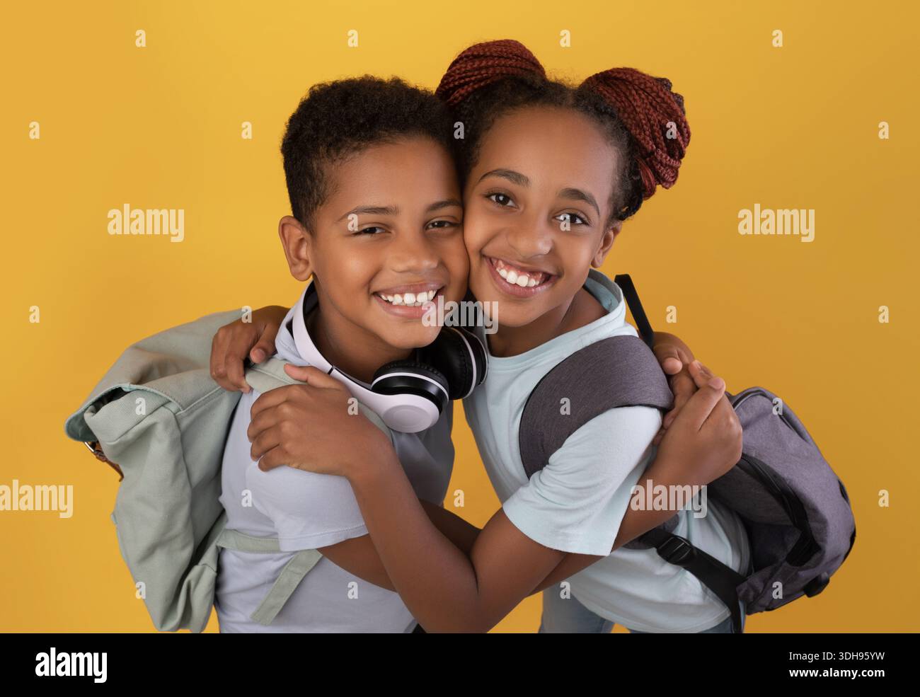 Twins embracing hi-res stock photography and images - Alamy