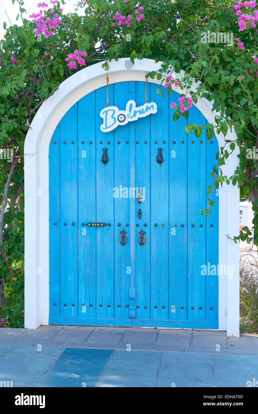 blue gate in the city harbor with the name and symbol of the city of ...