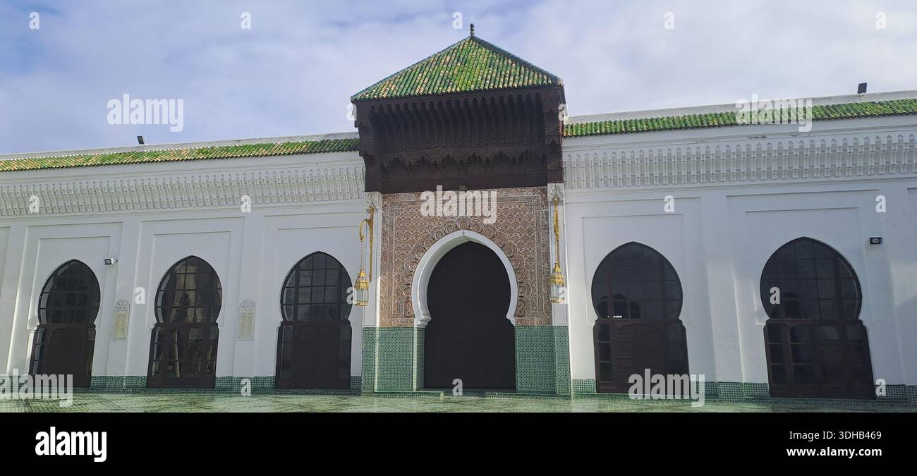 Mosque Fasade Moroccan mosque facade featuring traditional green zellij tiles and ...