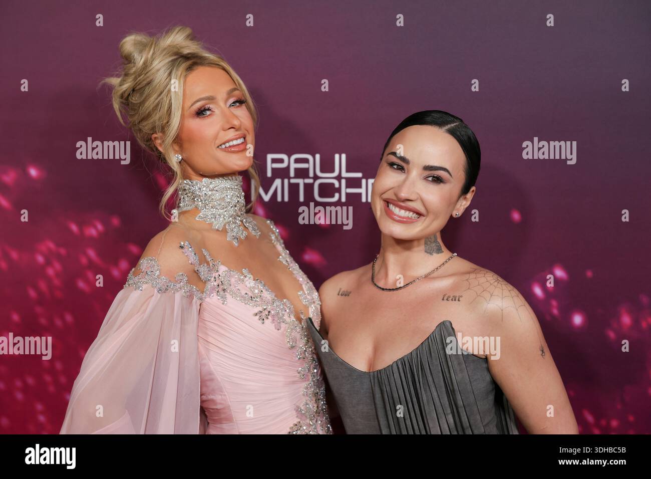 Paris Hilton, left, and Demi Lovato arrive at the world premiere of ...