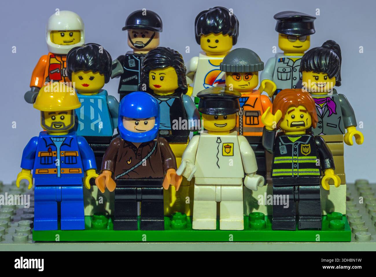 A group of twelve Lego characters Stock Photo