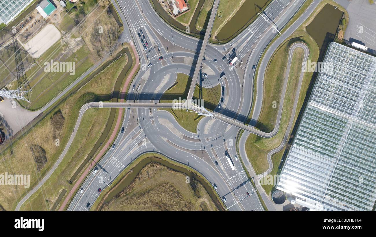 Aerial view of a turbo roundabout with traffic managing urban ...