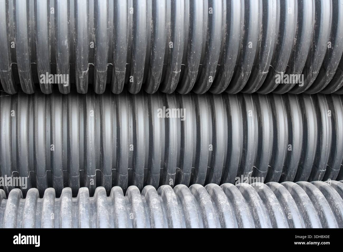 Coils flexible conduit pipes hi-res stock photography and images - Alamy