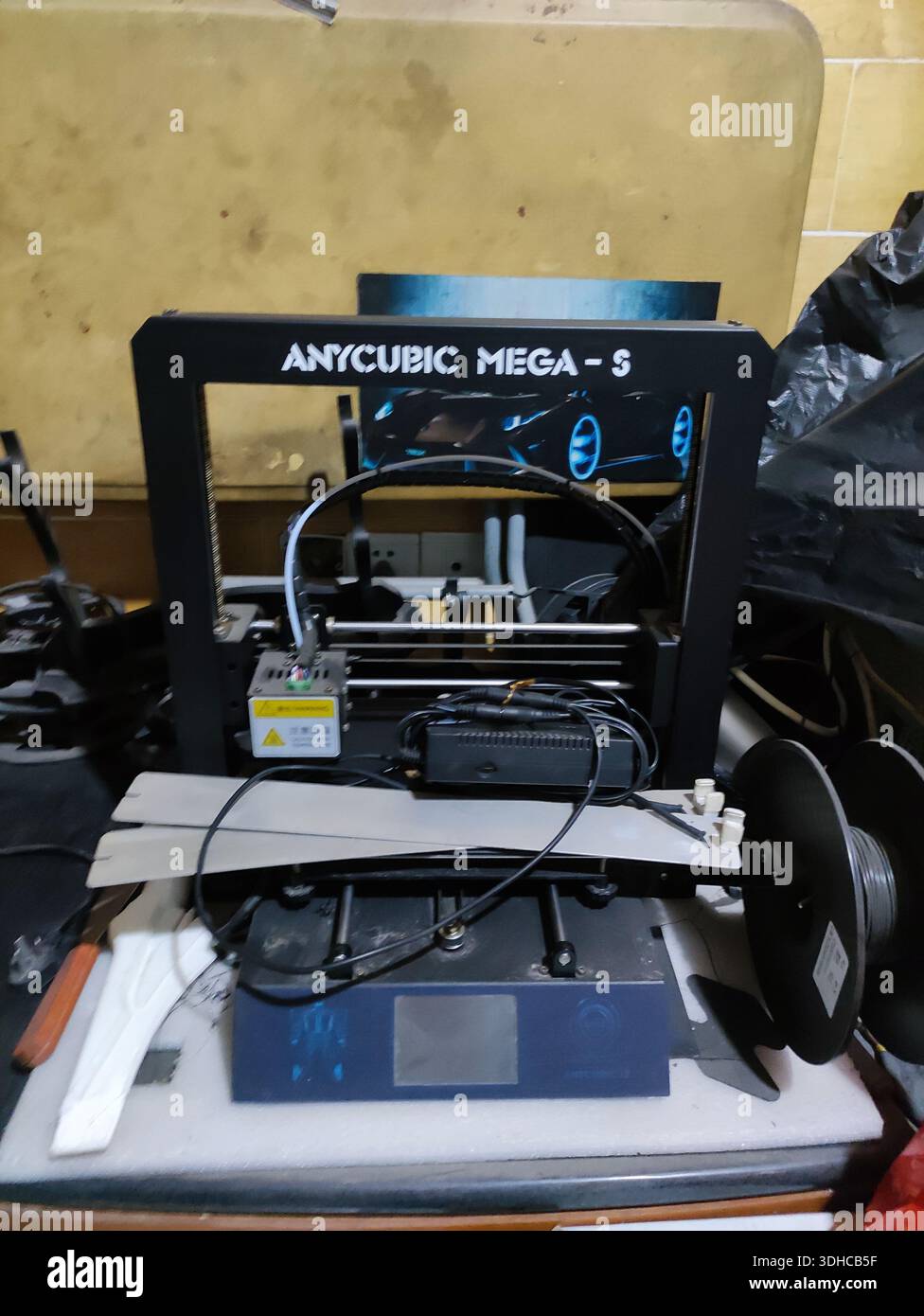 Anycubic Mega-5 3D Printer on Workbench with Filament Spool Stock Photo