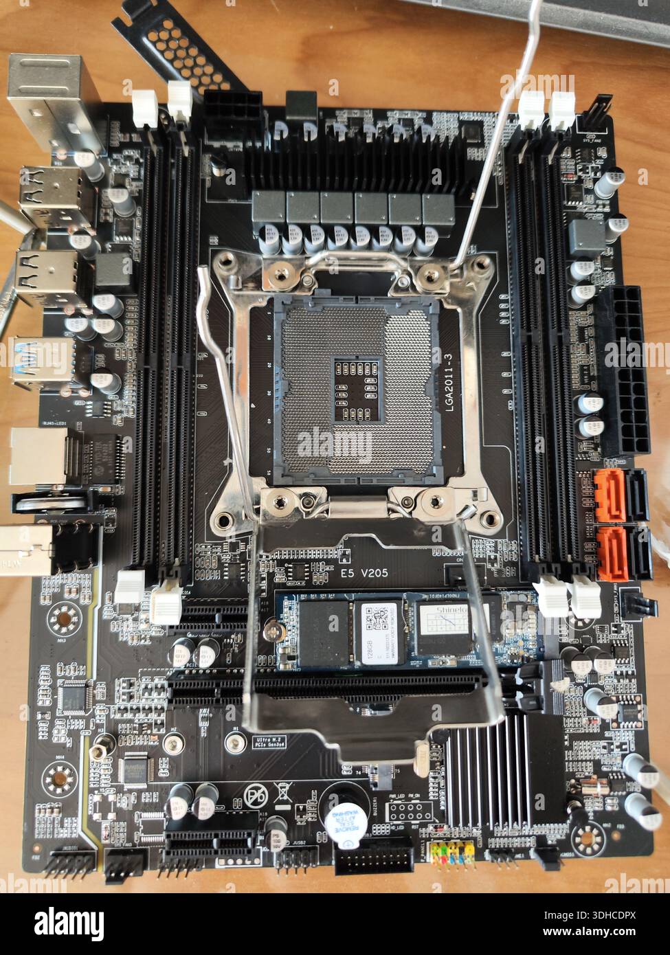 Close-up of a computer motherboard with CPU socket and components Stock Photo