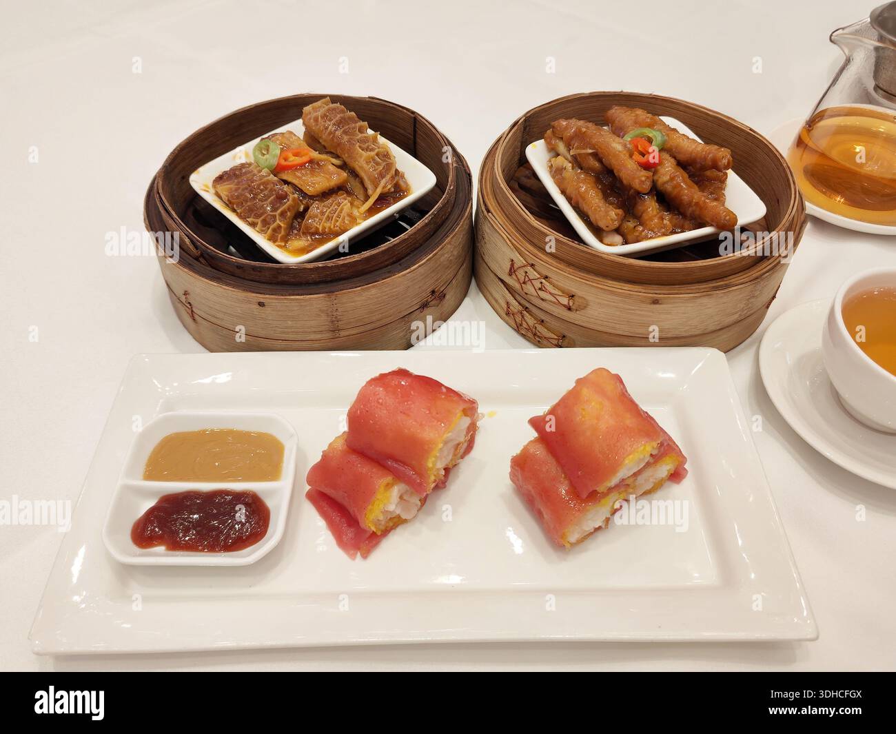 Traditional Chinese Dim Sum Set with Steamed Dumplings and Spring Rolls ...