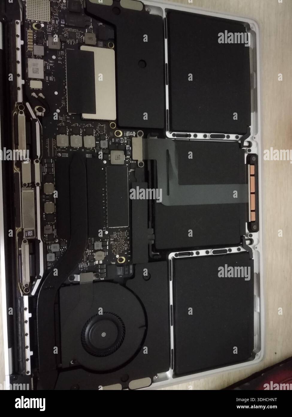 Internal components of a laptop computer with exposed motherboard ...