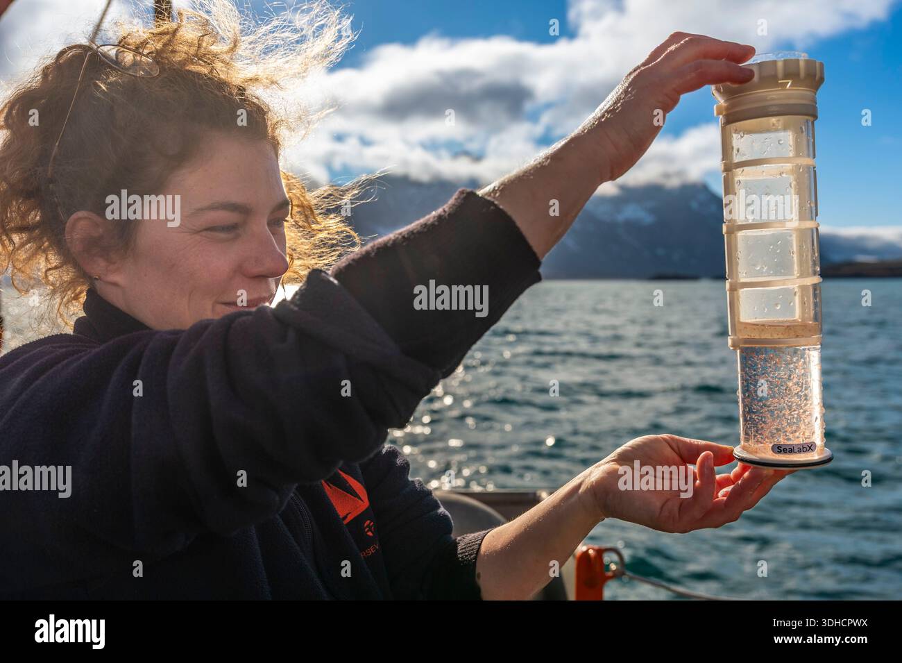 Norway, Svalbard archipelago, Spitsbergen Island, Greenland Sea, Isfjorden, plankton sampling for scientific research for the Plankton Planet program from the stern of the scientific schooner Persévérance belonging to polar explorer Jean-Louis ETIENNE Stock Photo