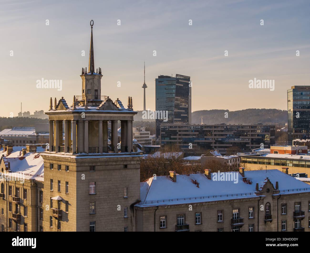 Aerial view of snow-dusted rooftops and Soviet-era architecture ...