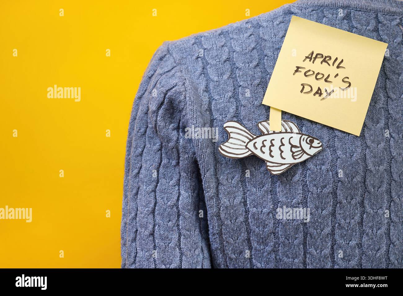 April 4th Sticky Note April fools' day sticky note with paper fish on sweater Stock Photo - Alamy