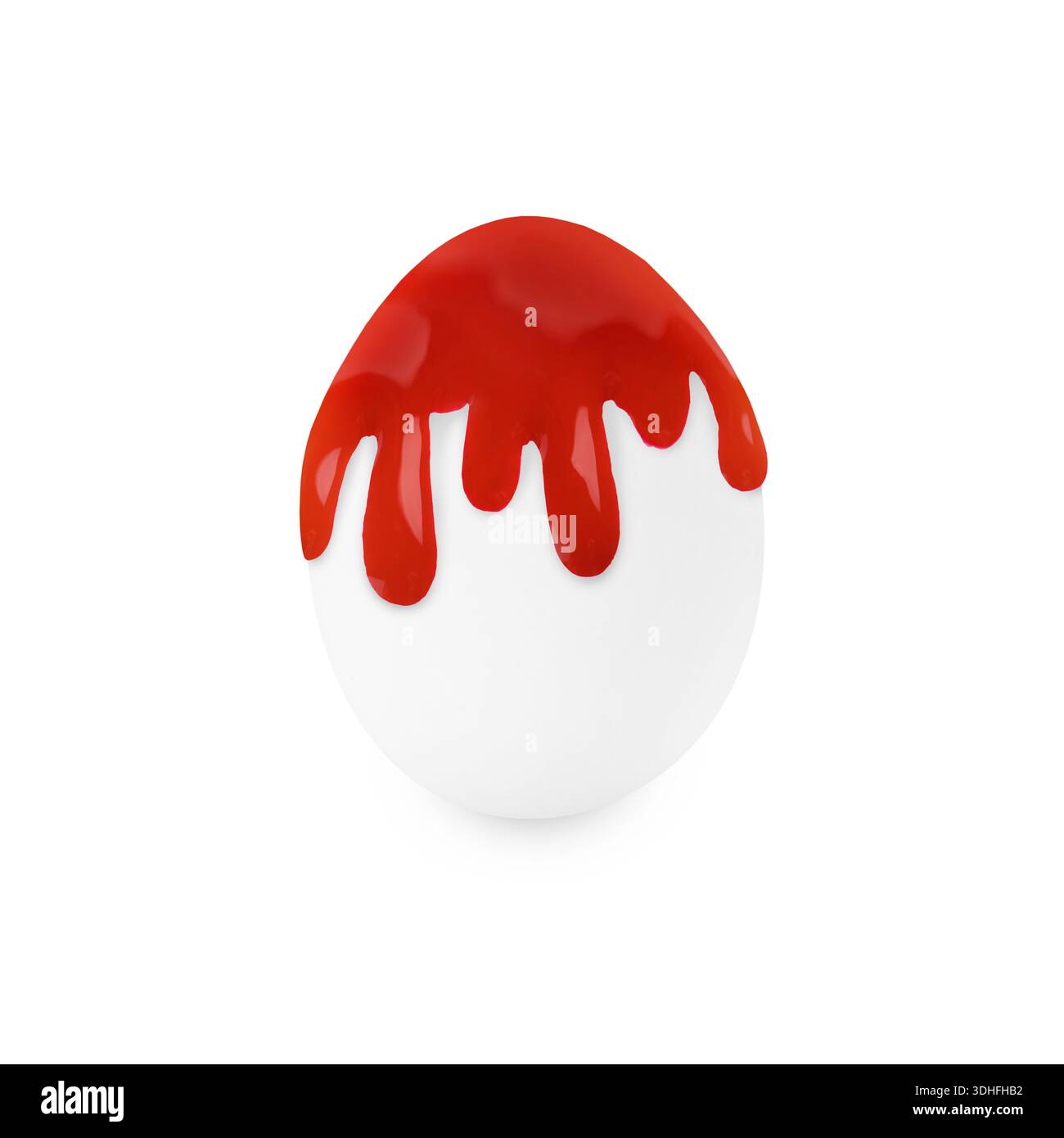 Red paint dripping down egg on white background. Easter celebration Stock Photo