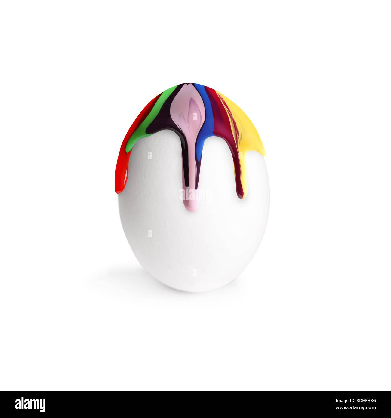 Colorful paint dripping down egg on white background. Easter celebration Stock Photo